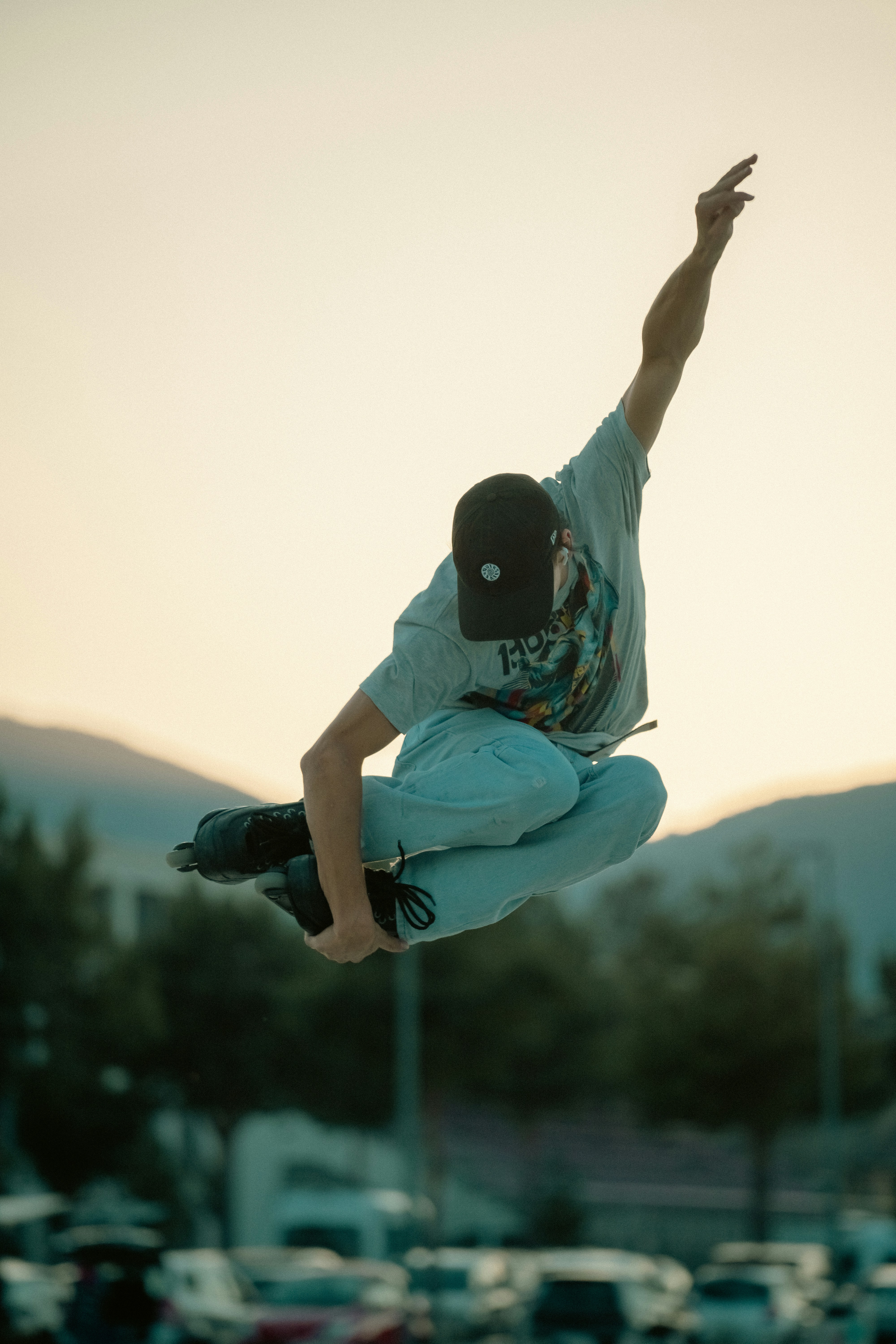 Man jumping with inline rollers
